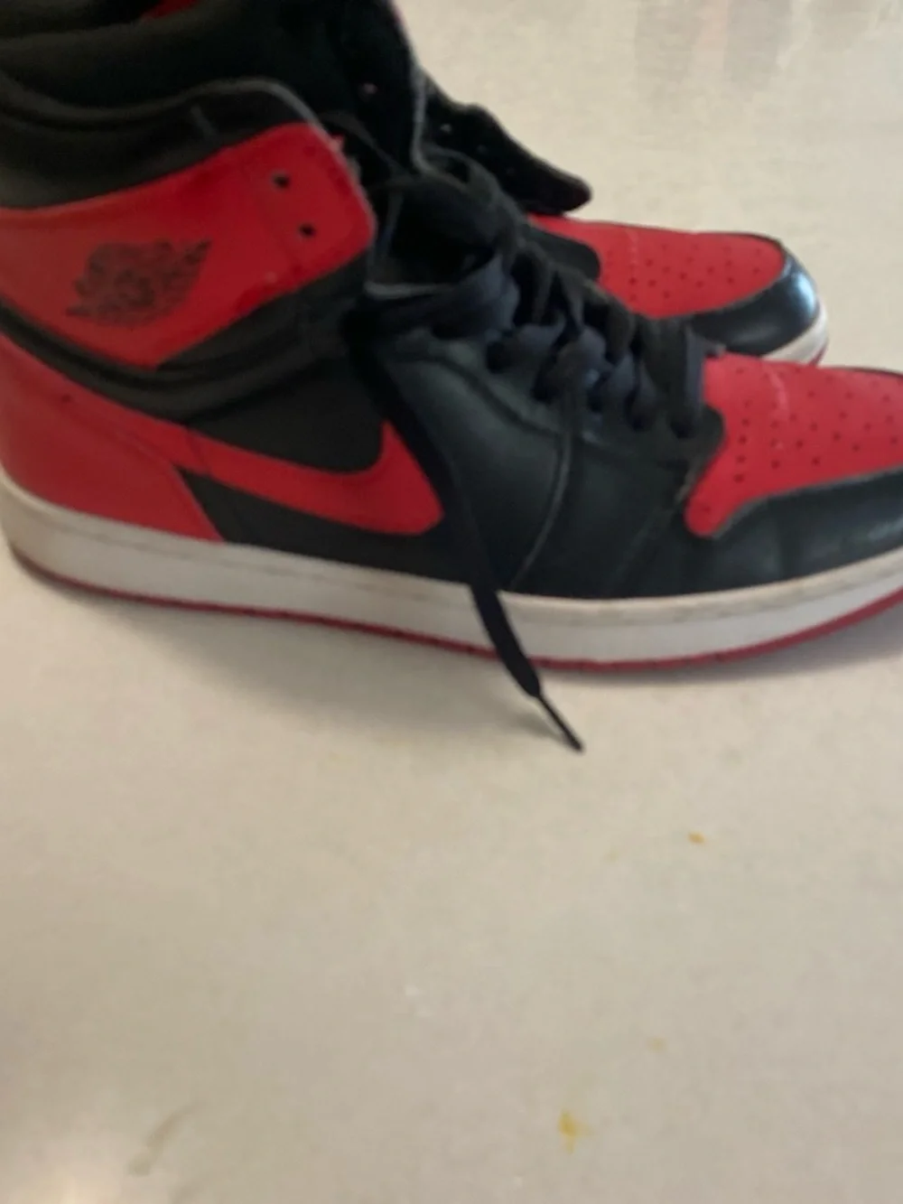 Jordan High-Top Sneakers in Black and Red